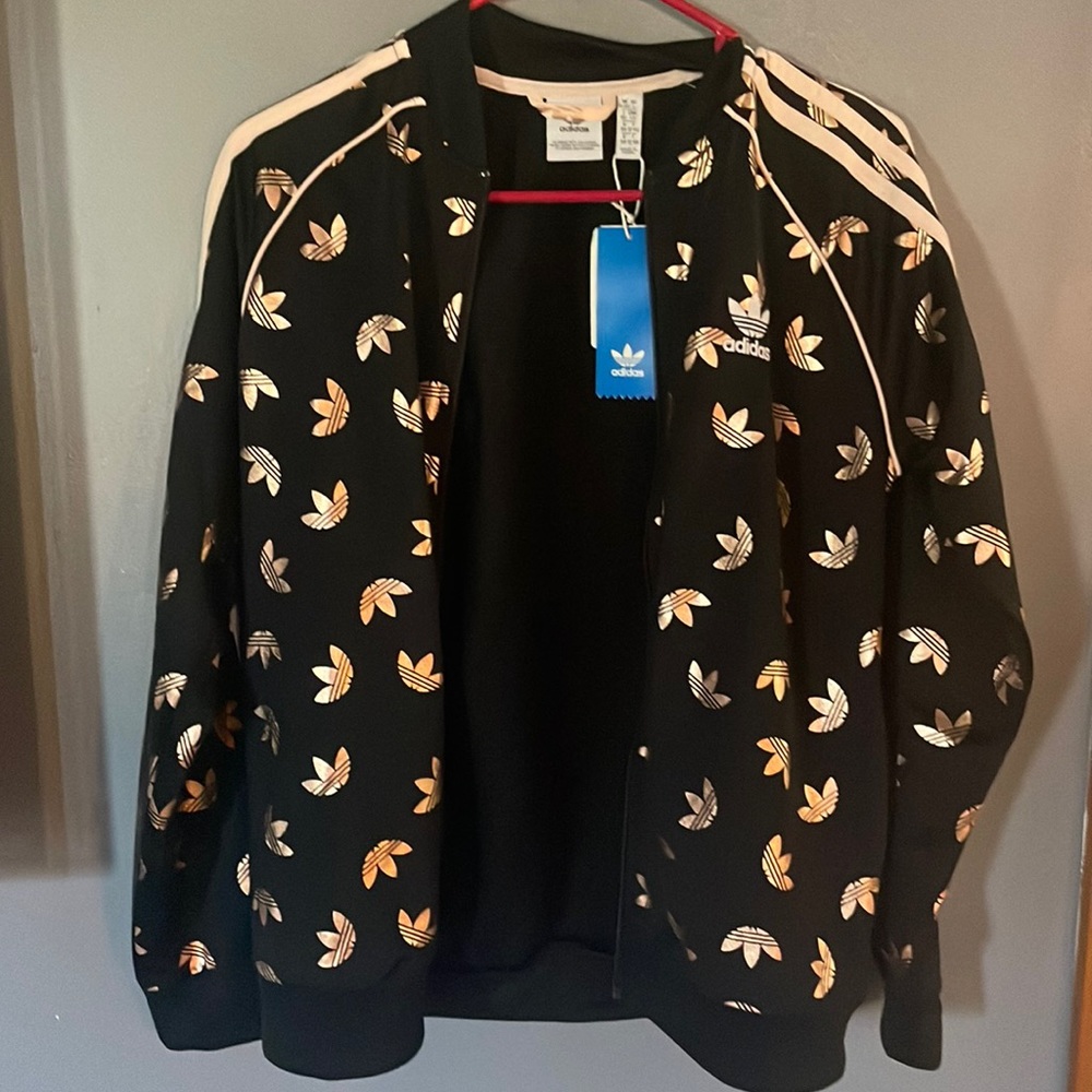 New big girls Adidas lightweight jacket.  Size Large.